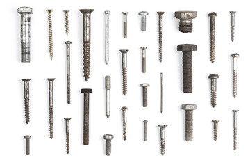 Set of different bolts nails and screws isolated on white background
