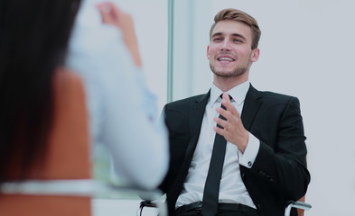 Portrait of confident business man discussing with his collegue