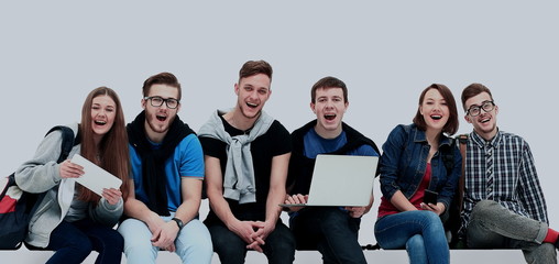 Causal group of people sitting on the floor isolated