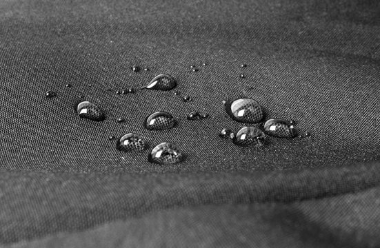 Dark waterproof fabric with waterdrops