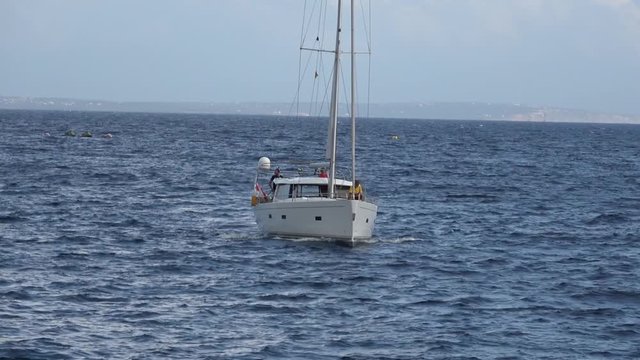 Sailing Yacht under Engine Coming to visit Ibiza Bay