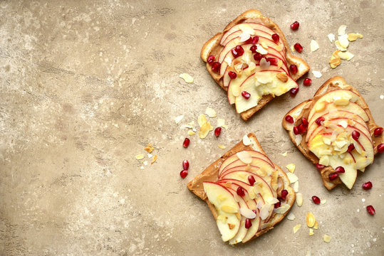 Toasts With Peanut Butter And Apple Slices.Top View With Copy Space.