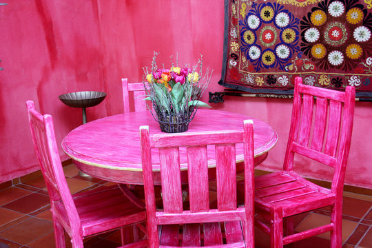 Colourful Moroccan tables and chairs.