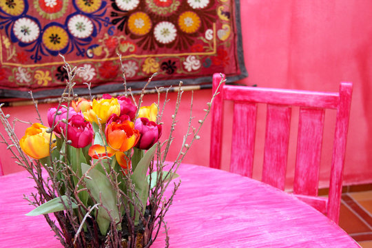 Colourful Moroccan tables and chairs.