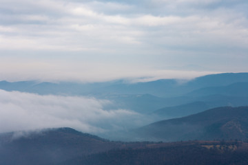 Landscape of foggy mountains