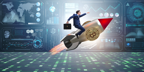 Businessman flying on rocket in bitcoin price rising concept