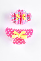 Collection of pink hair clips. Fashion design hair clips on white background. Girls hair accessory.
