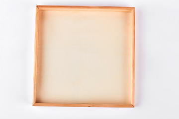 Blank wooden frame, white background. Wooden picture frame isolated on white background.