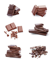 collection of various chocolate pieces on white background. each one is shot separately