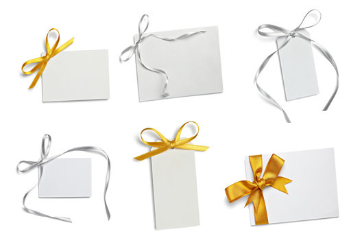 collection of various note papers with ribbon on white background. each one is shot separately