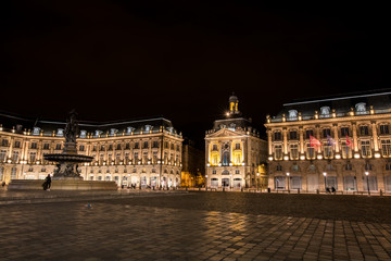 Urban streetview cityscape of Bordeaux France at night