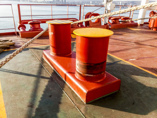 Mooring bollard on the decks of an industrial seaport