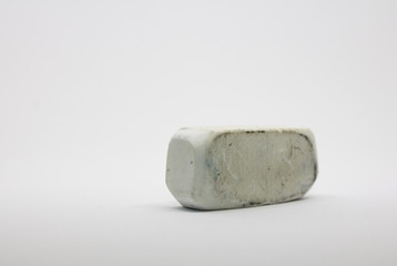 Old white Eraser on white background