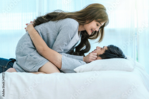 Closeup Hy Asian Lover Kissing And Hugging On The Bed In Bedroom Closeup Hy Asian Lover Kissing And Hugging On The Bed In Bedroom At Modern Home