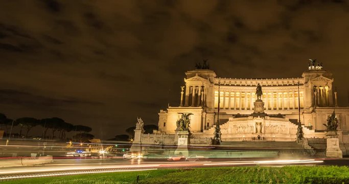 ROME, ITALY  – OCTOBER 2015 : Timelapse at Vittoriano / National Monument at night with clouds and traffic movement