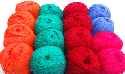 Close up view on knitting balls in different color