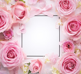 Fototapeta na wymiar Pink rose with paper card