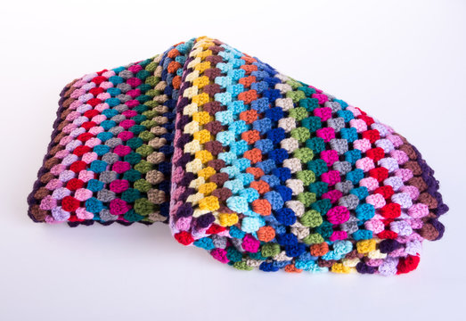 crochet or crochet blanket on a background.
