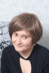 smiling woman with brown eyes