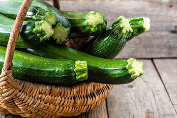 Basket with zucchini, green vegetables, organic farm fresh produce, bio food