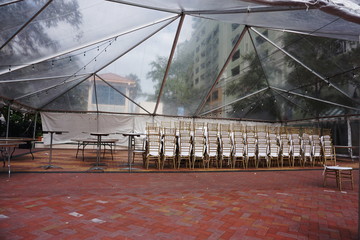 Wedding Event Venue Set-Up with Stacked Chairs