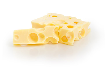 Two pieces of Swiss-type cheese different sizes