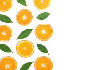 Slices of orange or tangerine with leaves isolated on white background with copy space for your text. Flat lay, top view