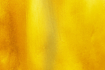 elegant gold painted on cement and concrete texture for pattern and background