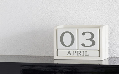 White block calendar present date 3 and month April