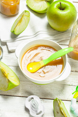 Baby food. Baby puree from fresh green apples.