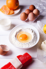Mix the ingredients and kitchen utensils, candied fruit for baking bread, vertical photo