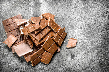 Broken chocolate bars. O