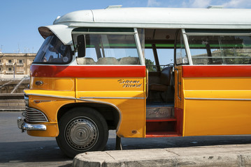 vintage british bedford buses on street of la valletta malta