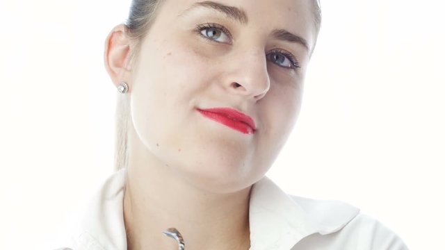 4k closeup video of beautiful playful woman with red lipstick showing emotions on camera