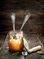 Marinated cabbage in glass jar.