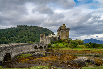 Obraz premium Eilean Donan castle on a cloudy day, Highlands, Scotland, UK