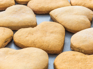 Fototapeta na wymiar Homemade ginger biscuits in the shape of a heart