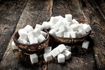 Cubes of sugar in a bowl.