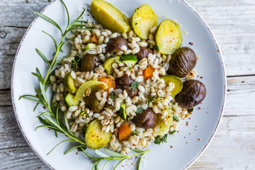 Chestnut salad with pearl barley and vegetables. 