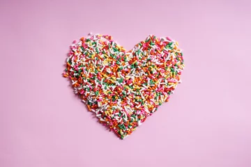Fotobehang candy sprinkles in form of heart © shersor