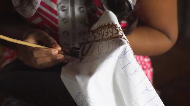 Local Artisan Making Batik using Traditional Tool in Sri Lanka
