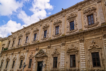 Fototapeta na wymiar Baroque architecture on the facade of a palace in Lecce, southern Italy