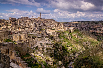 Fototapeta na wymiar Amazing scenic panorama of Matera town in southern Italy with its labyrinth of streets and rock buildings that make it a wonderful cultural destination