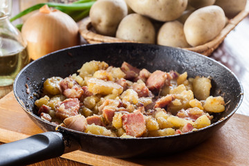 Fried potatoes with onion and bacon