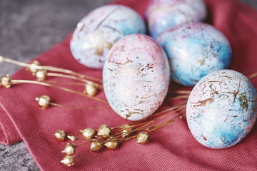 Ornate easter eggs on tablecloth