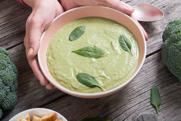 Cream soup with broccoli and baby spinach