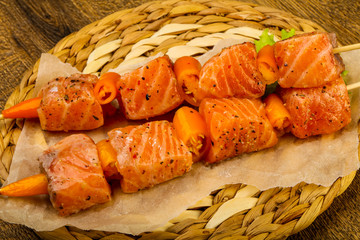 Raw salmon skewer