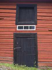 Old red wooden barns in the city of Porvoo in Finland.