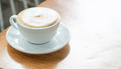 hot coffee on desk in the morning
