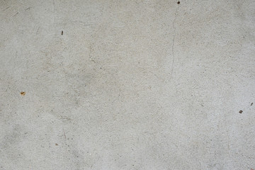 Wall fragment with scratches and cracks